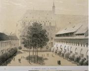 à l'arrière-plan l'église des Dominicains.